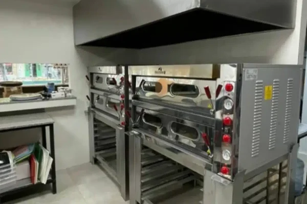 Campana de bajo perfil para cocinas de restaurante con techo bajo